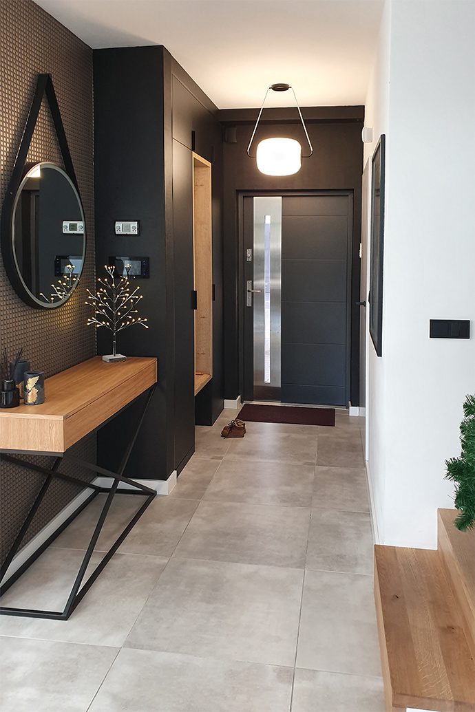 Schwarz Holzschiebetür im Wohnzimmer | RENO Türen